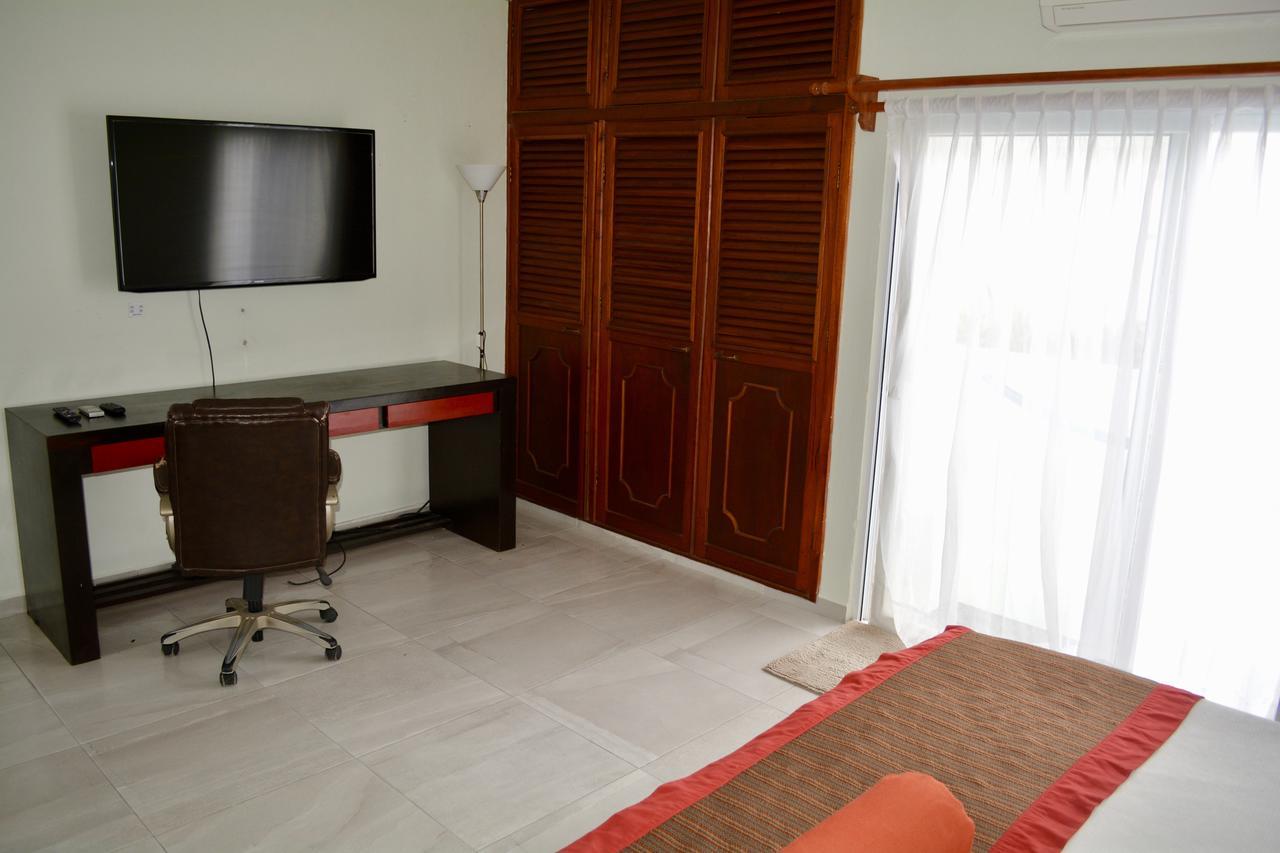 Suites Sanrey Пуэрто-Морелос Экстерьер фото